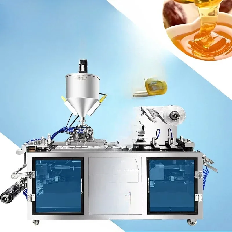 Máquina automática para el envasado de cosméticos líquidos como miel y aceite de oliva, con formación de blísteres, llenado y sellado.