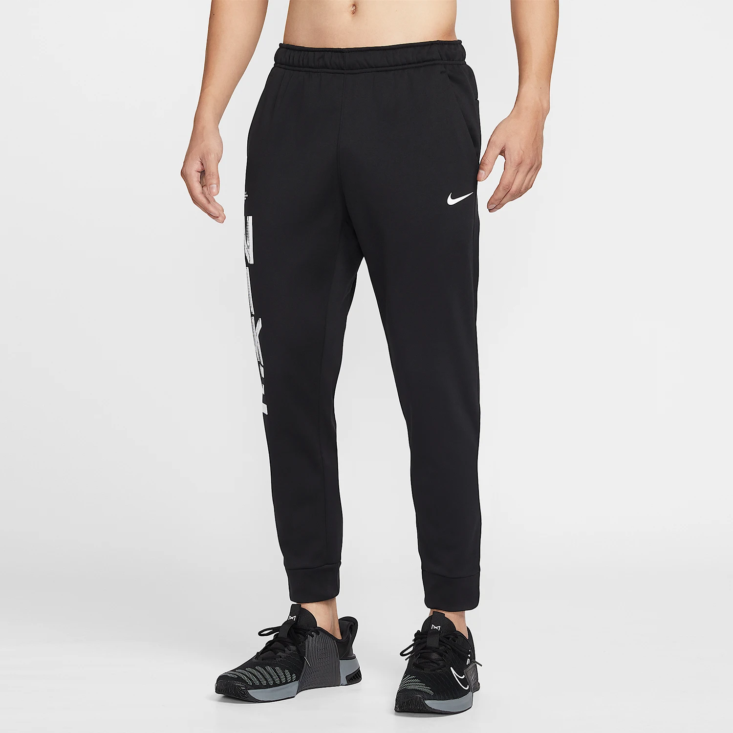 

Оригинальные мужские трикотажные брюки Nike Therma FIT с принтом на щиколотке IF2195-010