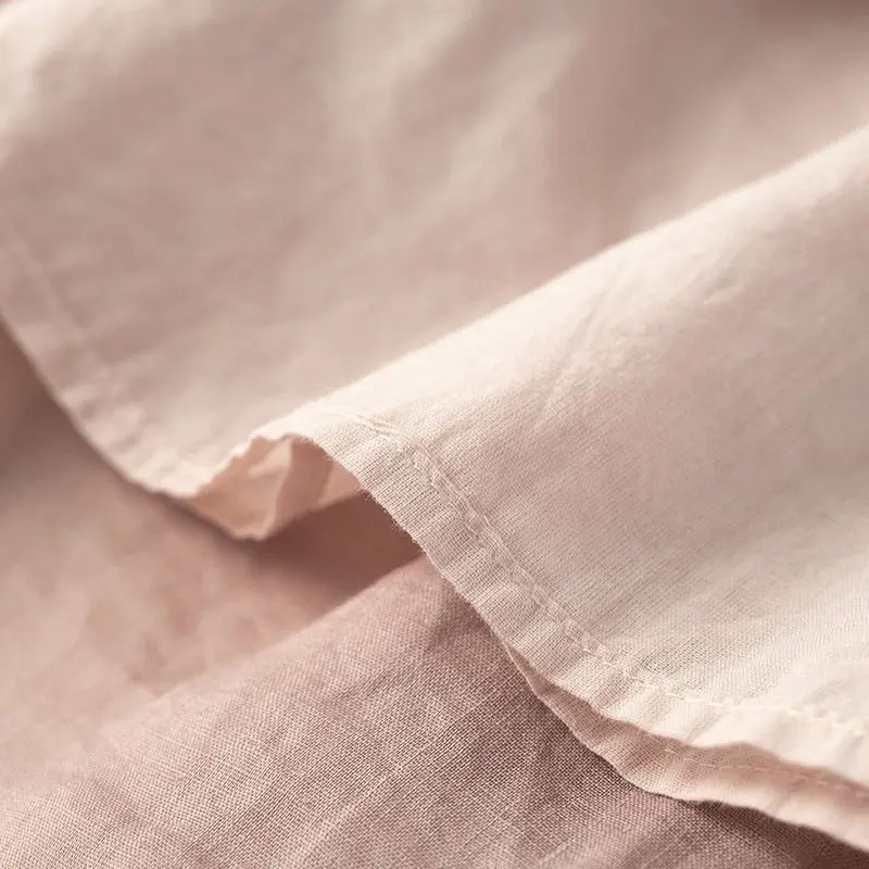 2025 Retro bawełniana i lniana osłona bioder z płynną spódnicą w jednolitym kolorze średniej długości