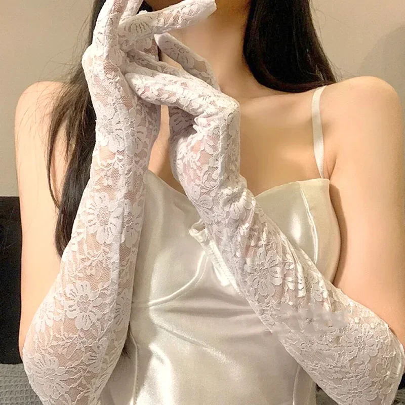 Guanti lunghi da donna in pizzo floreale trasparente Lolita Kawaii Guanti a rete bianchi neri Guanti estivi con protezione solare UV