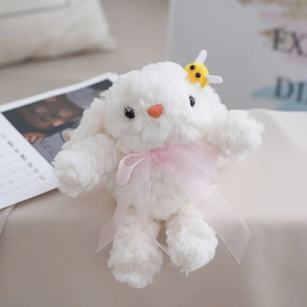ตุ๊กตากระต่ายขนนุ่มแบบใหม่ กระเป๋าตุ๊กตาการ์ตูนผูกโบว์ ของเล่นตุ๊กตาแบบมีพวงกุญแจ ของขวัญ ห้อยตกแต่งหูห้อย
