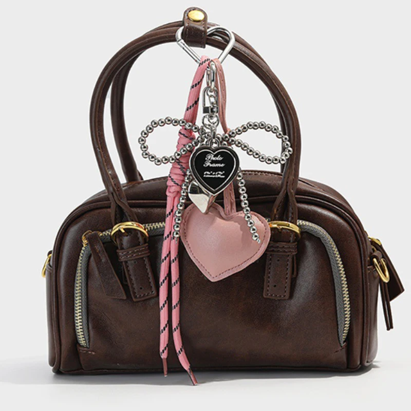 

Elegant PU Love Woven Rope Keyring - Bow-knot Charm Accessory for Women's Handbags