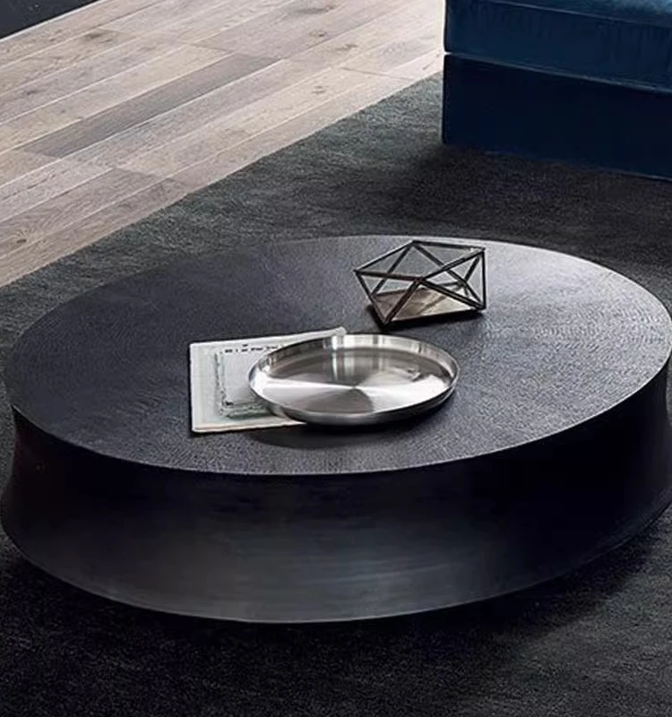 Nordic Japanese black oak coffee table creative round Italian style coffee table creative.