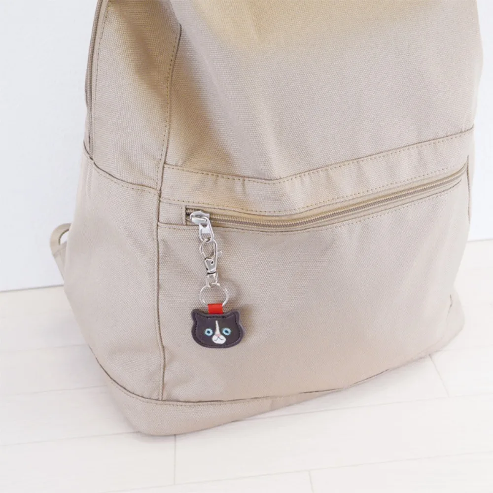 جديد لطيف الجلود القط المفاتيح الإبداعية الكرتون لطيف القط المفاتيح حقيبة جلدية قلادة موضة Kawaii هريرة كيرينغ على ظهره