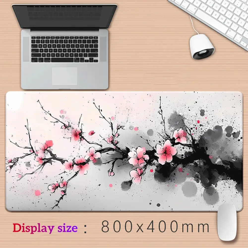 

The 800x400mm anti-slip rubber base of the ink-style plum blossom mouse pad is very suitable for gaming and office use