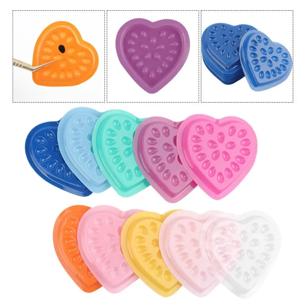 100 pz colorato adesivo colla per ciglia titolare PVC a forma di cuore colla per ciglia Pallet fiore guarnizione in plastica Palett