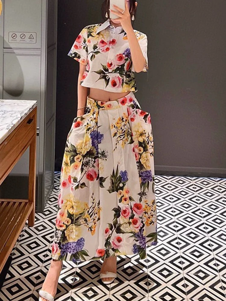 Design sense Spring and Summer new women's two-piece printed short shirt top+double pocket buttons big skirt fashion suit