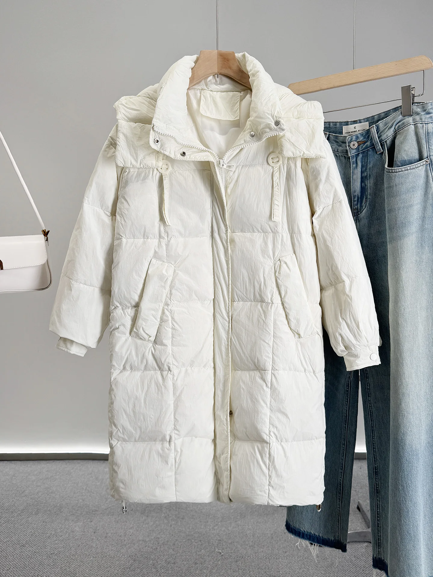 패셔너블 다용도 루즈 슬림 후드 미드 길이 다운 재킷 여성용 심플 슬리 VK2025 가을 겨울 신상품