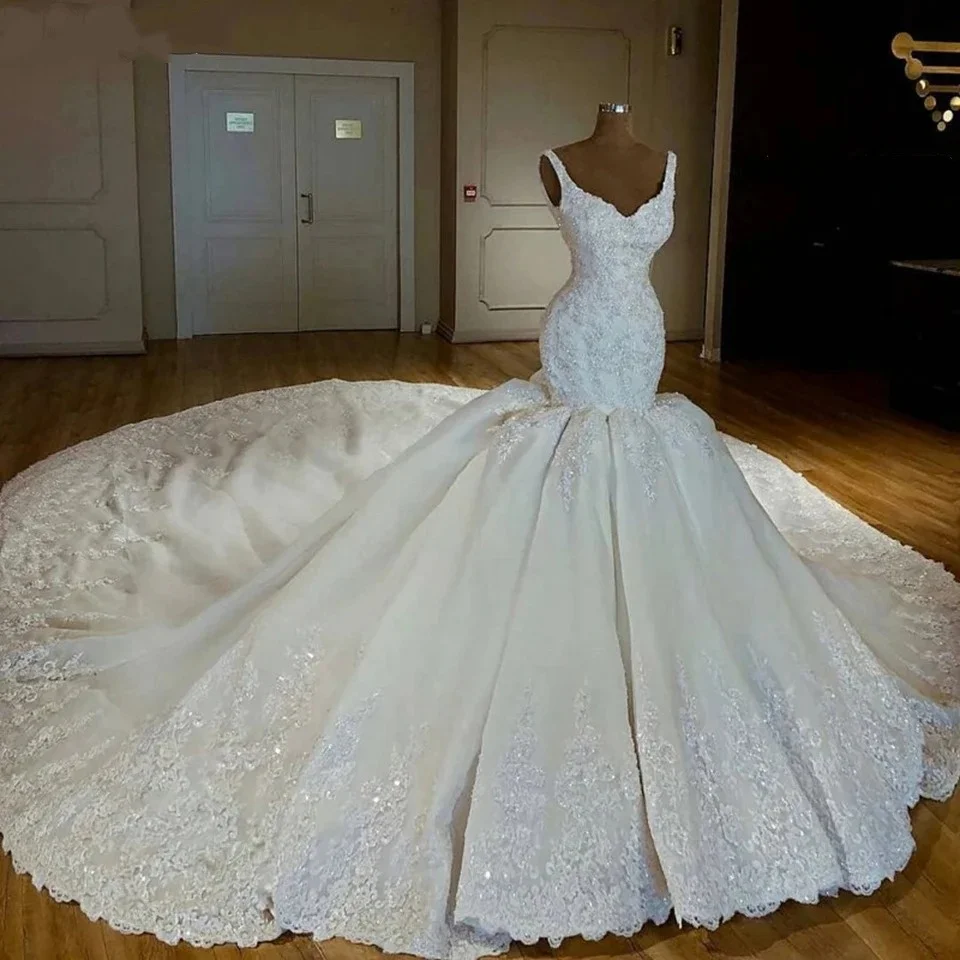 

Customized Spaghetti Strap Sequin Appliques Sleeveless White Wedding Dress 2026 Mermaid Floor Length Sweep Train Bridal Gown