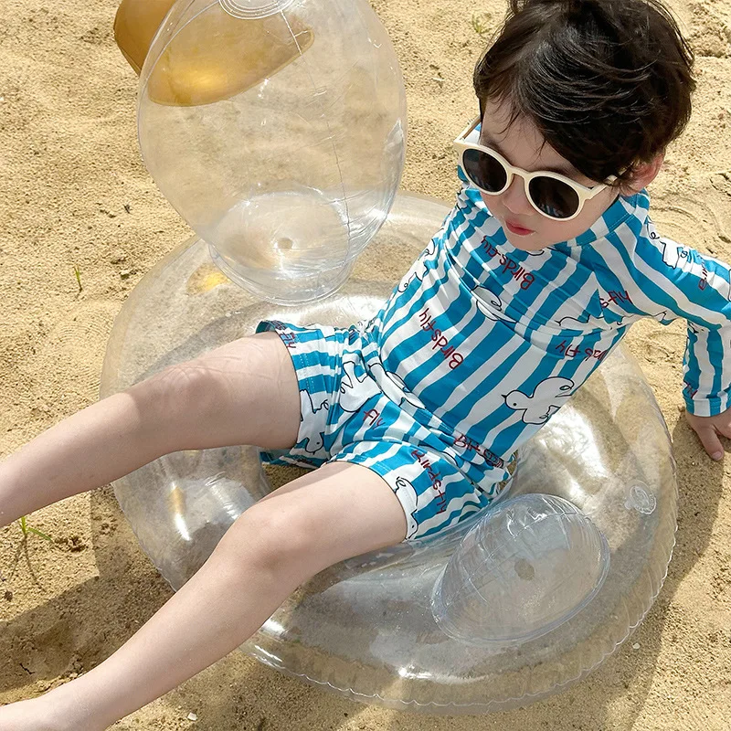 بدلة سباحة قطعة واحدة ملونة للأطفال من WackDaria للأولاد للحماية من الأشعة فوق البنفسجية ملابس شاطئ جميلة منقوشة بدلة استحمام للأولاد للمتعة