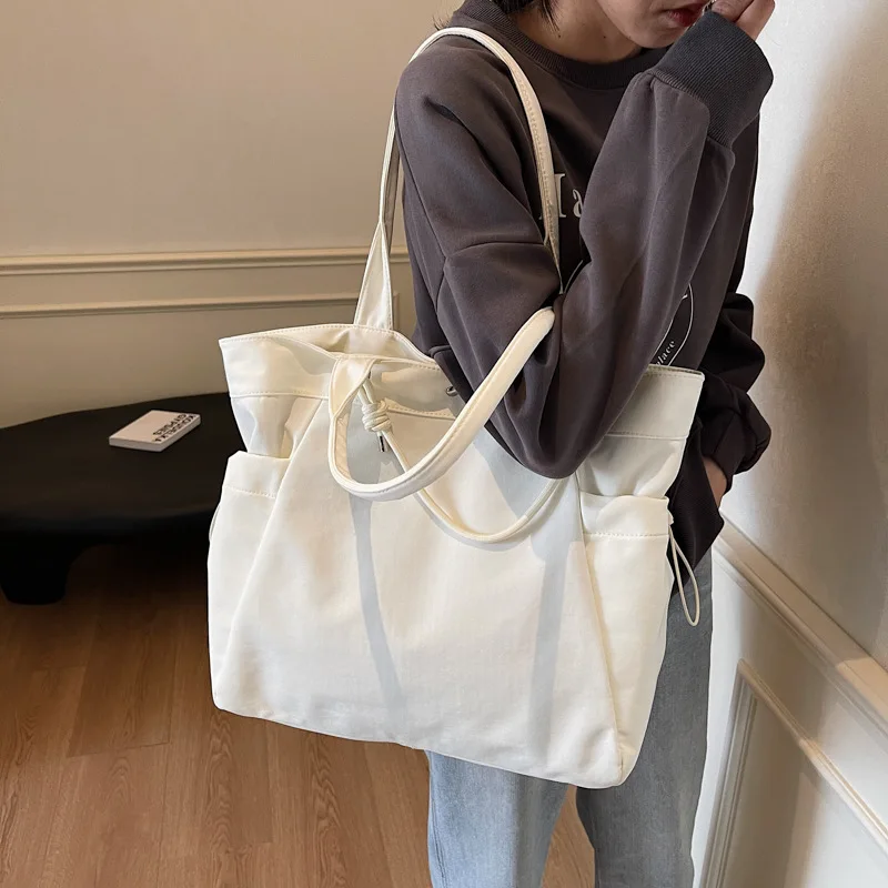 Lightweight Waterproof Large-capacity Tote Bag Women's New Versatile Casual Short-distance Travel Bag Multi-pocket Niche Handbag