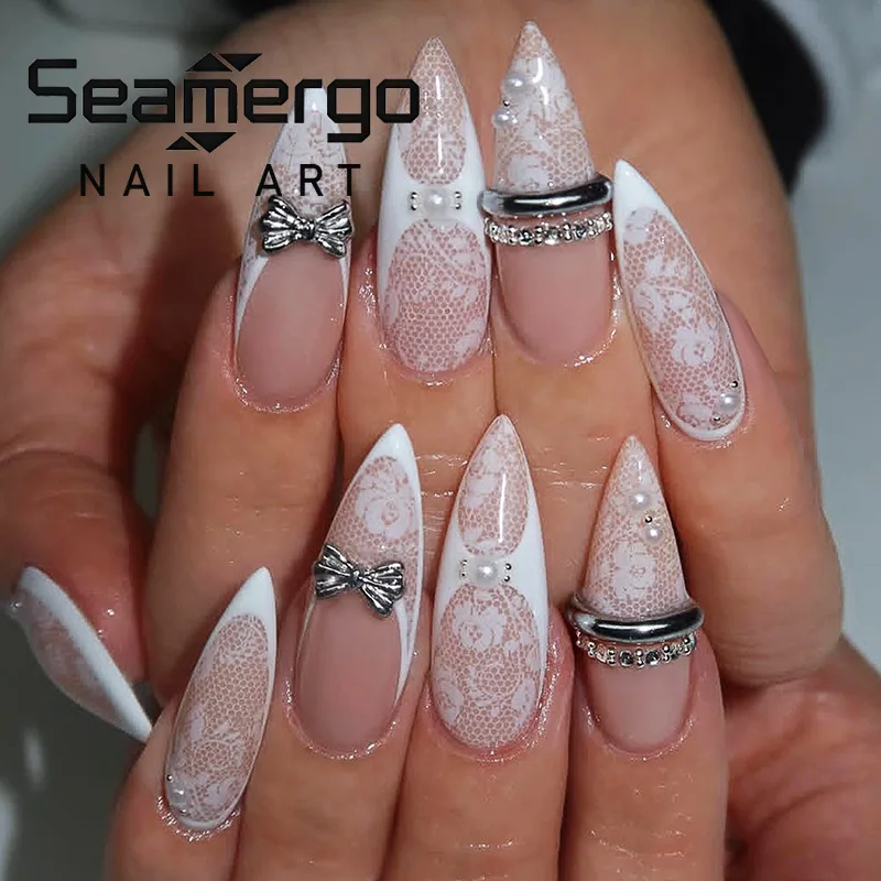 

24PCS Y2k Stiletto Stick on False Nails Simple White Lace Flower French Nail Tips Metallic Silver 3D Bow Pearl Almond Fake Nails