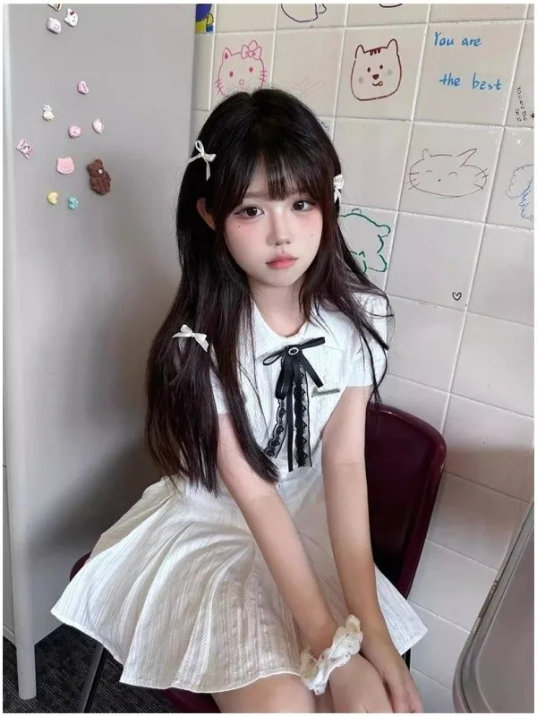 Letnia, słodka, herbaciana przerwa na herbatę, wyszczuplająca talia, kołnierzyk ort Dr, damska biała spódnica w kształcie litery A, pojedynczy element.