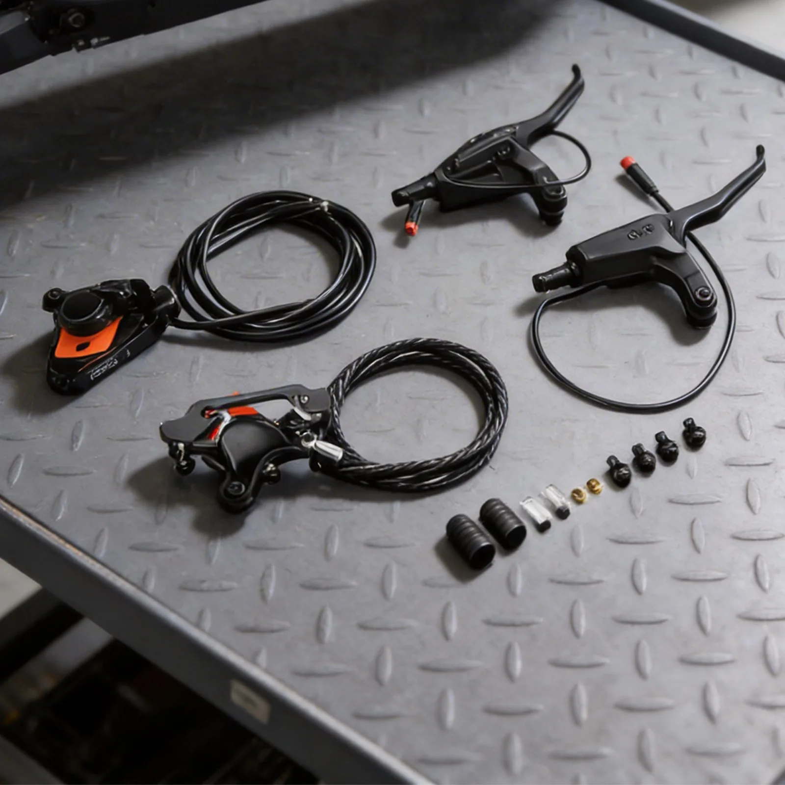 Hydraulic disc brake assembly with integrated brake sensor for NUTT electric bicycles optimized for smooth and effective braking