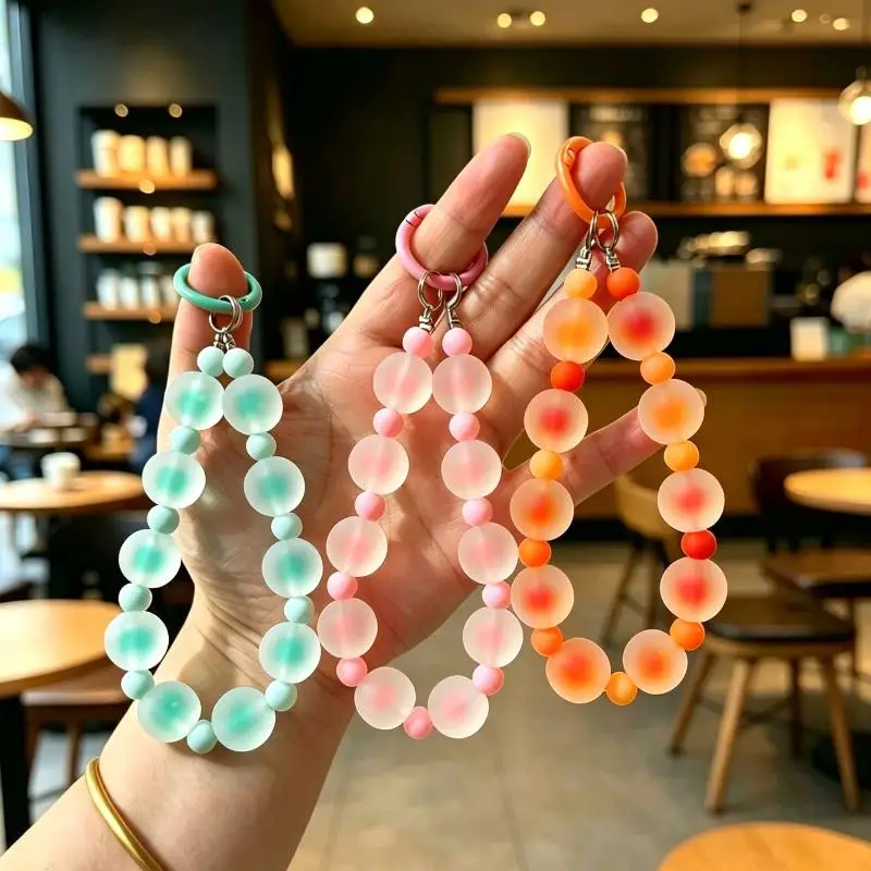 1 Stück Damen-Handgelenkskette Handyband im koreanischen Stil, Anti-Verlust-Schlüsselband mit Dopamin-inspiriertem Mattperlen-Anhänger – Detail 1