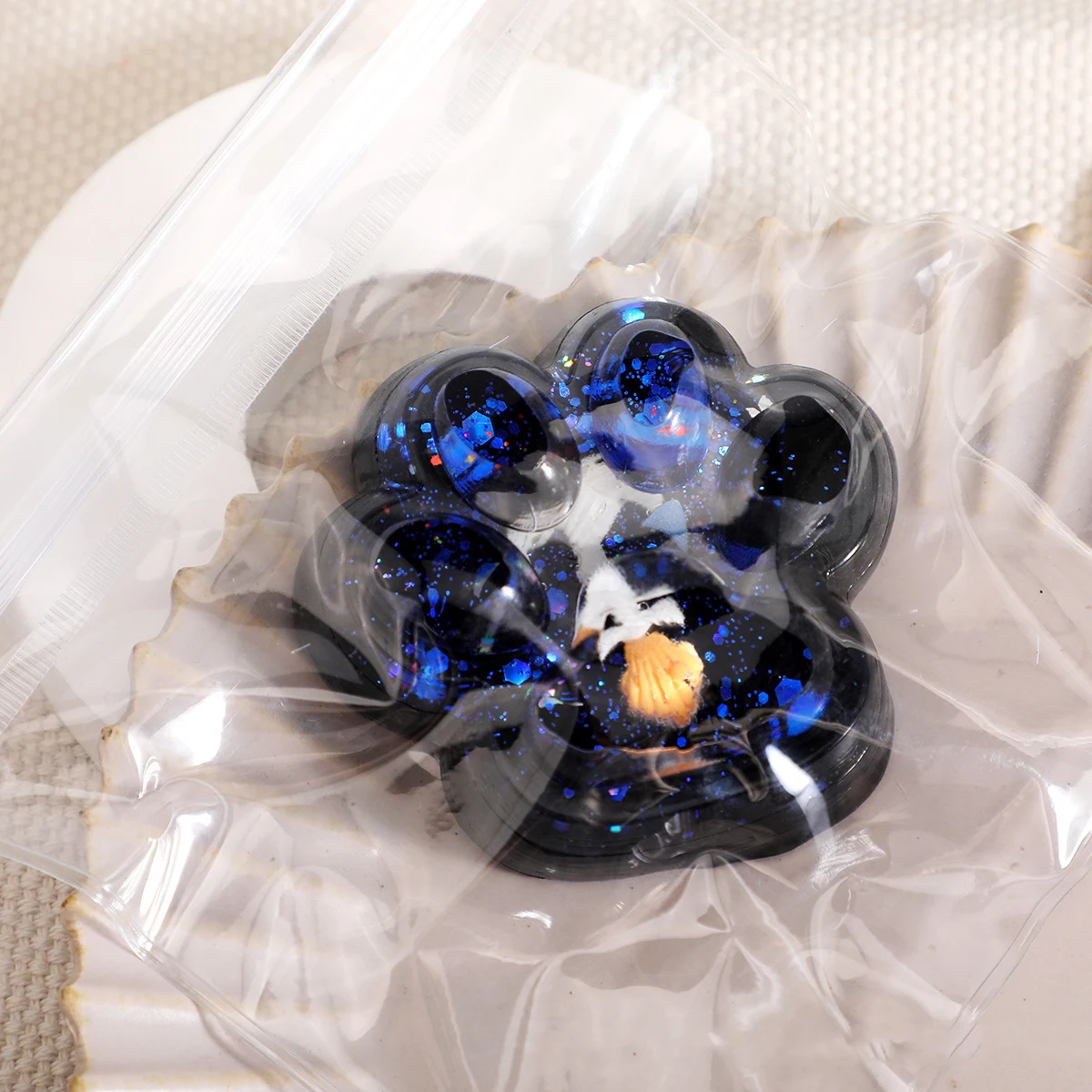 Nouveau chat patte Mochi Taba Fidget presser jouet mignon ciel étoilé chat pied rebond lent pincement décompression jouet soulagement du Stress Vent jouet