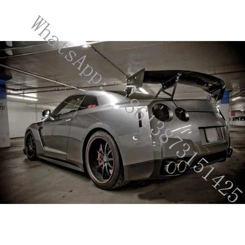 

Suitable GTR R35 Carbon Fiber ARM-Style Large Fixed Rear Spoiler Wing