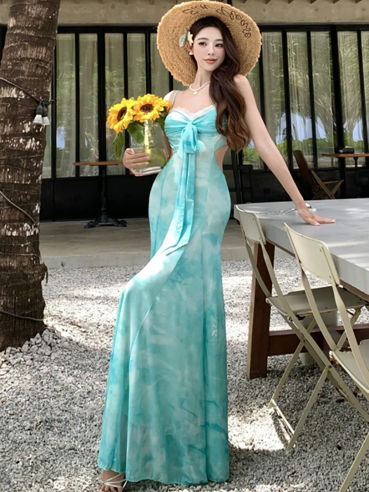 ฤดูร้อนสีเขียวตาข่ายพิมพ์ Hollow OUT ชุดผู้หญิงโบว์ลูกไม้สแควร์เซ็กซี่ชุดสลิง 2025 ใหม่เกาหลีสไตล์ชายหาดชุด