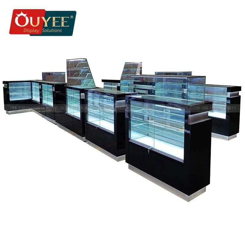 

Индивидуальный дизайн интерьера курительного салона: витрина-прилавок, роскошный высокий стеклянный шкаф, демонстрационные витрины для курительных товаров