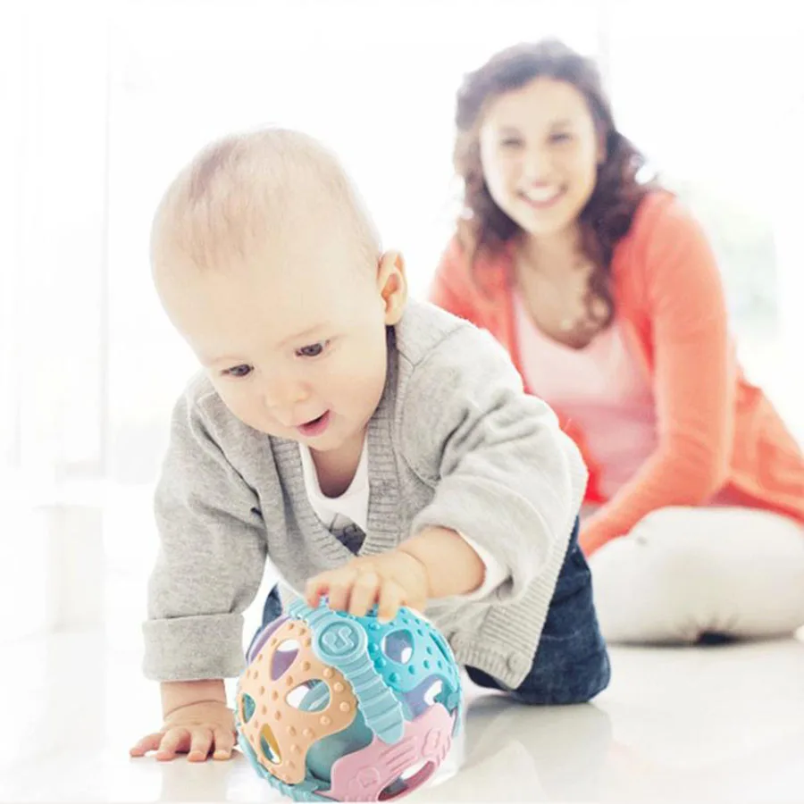 Boule en caoutchouc souple avec trou de boucle pour bébé, jouets à mâcher, puzzle d'éducation précoce, formation à la préhension, nouveau, Manhattan