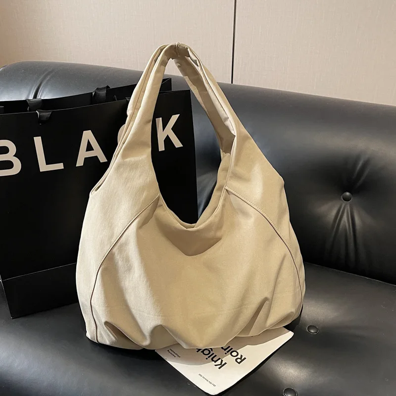 

Новая корейская складная повседневная сумка через плечо, вместительная, легкая, удобная и универсальная, с текстурой, в стиле Coach.