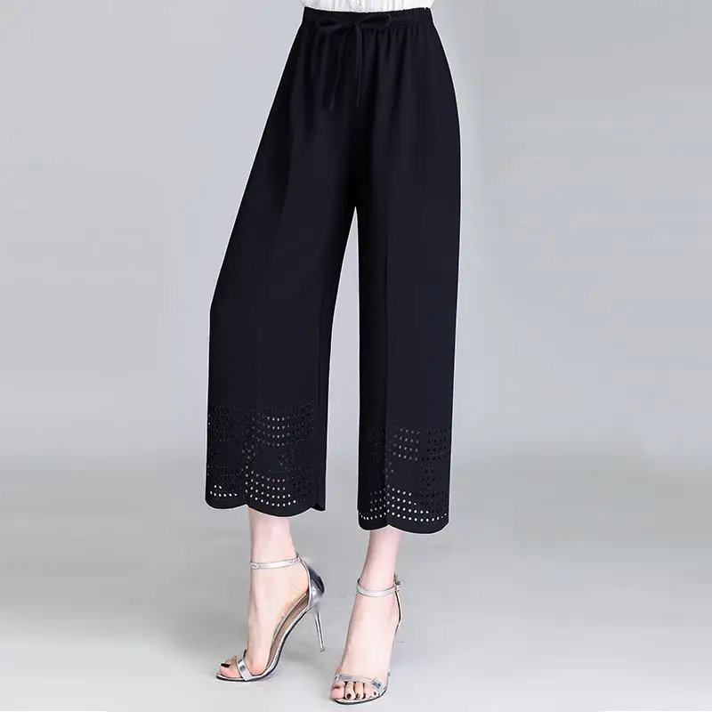 2023 Fashionable Loose Fitting Casual High Waisted Lace Up Hollowed Out Jacquard Temperament Versatile Nine Point Wide Leg Pants