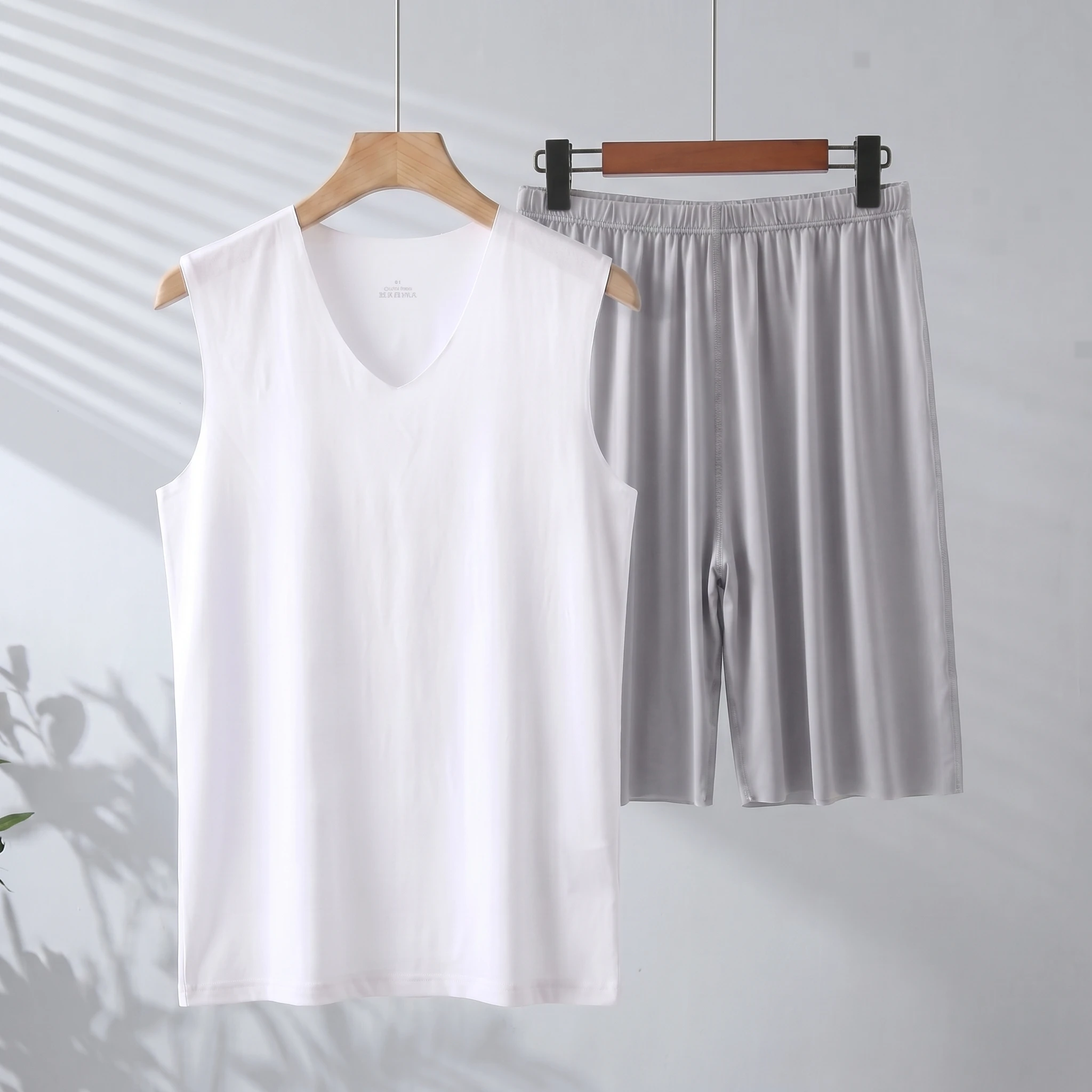 White vest + gray shorts