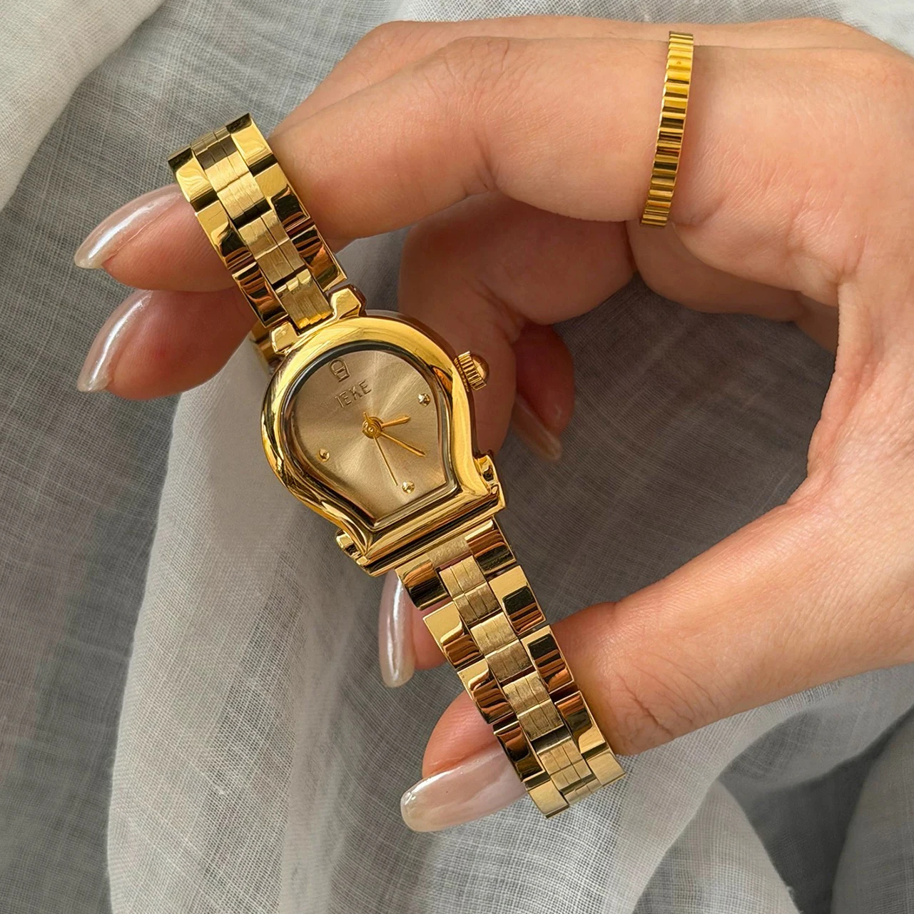 reloj-de-cuarzo-con-forma-de-arco-elegante-y-con-personalidad-para-mujer-reloj-de-pulsera-accesorios-de-joyeria