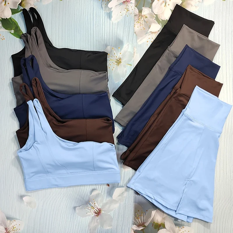 2 قطعة تنورة رياضية قصيرة اليوغا مجموعة النساء فستان التنس الصالة الرياضية البدلة الرياضة حمالات الصدر قصيرة تنورة الغولف تجريب مجموعات اللياقة البدنية الملابس