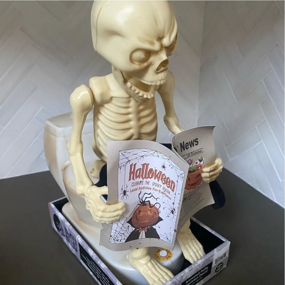 Reading Newspapers Farting Skeleton on Toilet Skull Decoration Spooky Potty Skeleton Animated Decor Sitting On The Toilet