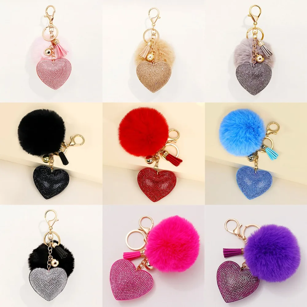 LLavero de bola de felpa de piel sintética a la moda, bolso de aleación de Color sólido, colgante de corazón con diamantes de imitación, llavero para niña