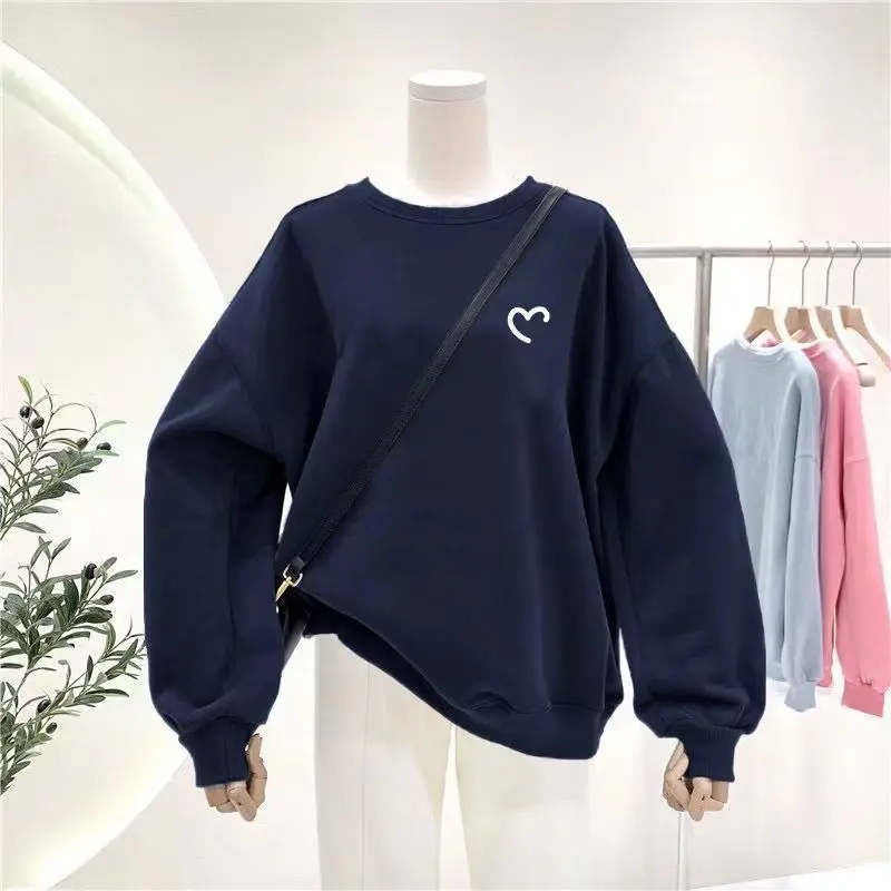 "His & Hers K-Style Tees. Unique prints, soft fleece, and an effortless oversized fit for couples."