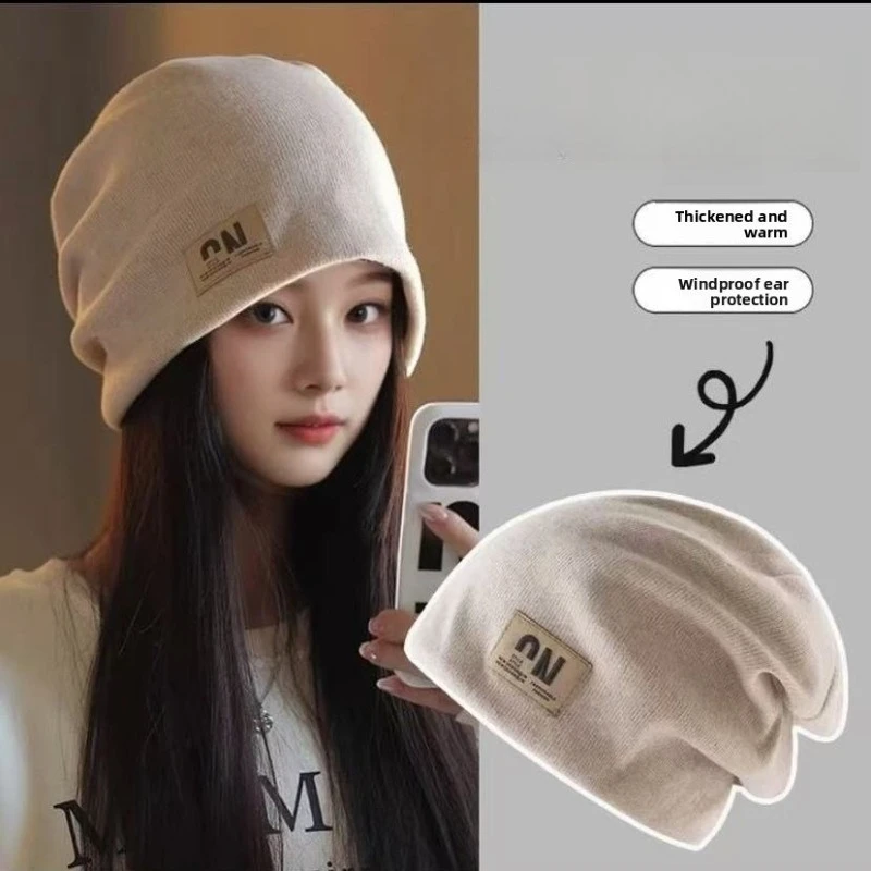 El nuevo estilo de gorro cálido con protección para los oídos, gorro tejido Baotou para mujer, muestra la cara, pequeño sombrero salvaje a prueba de viento para confinamiento
