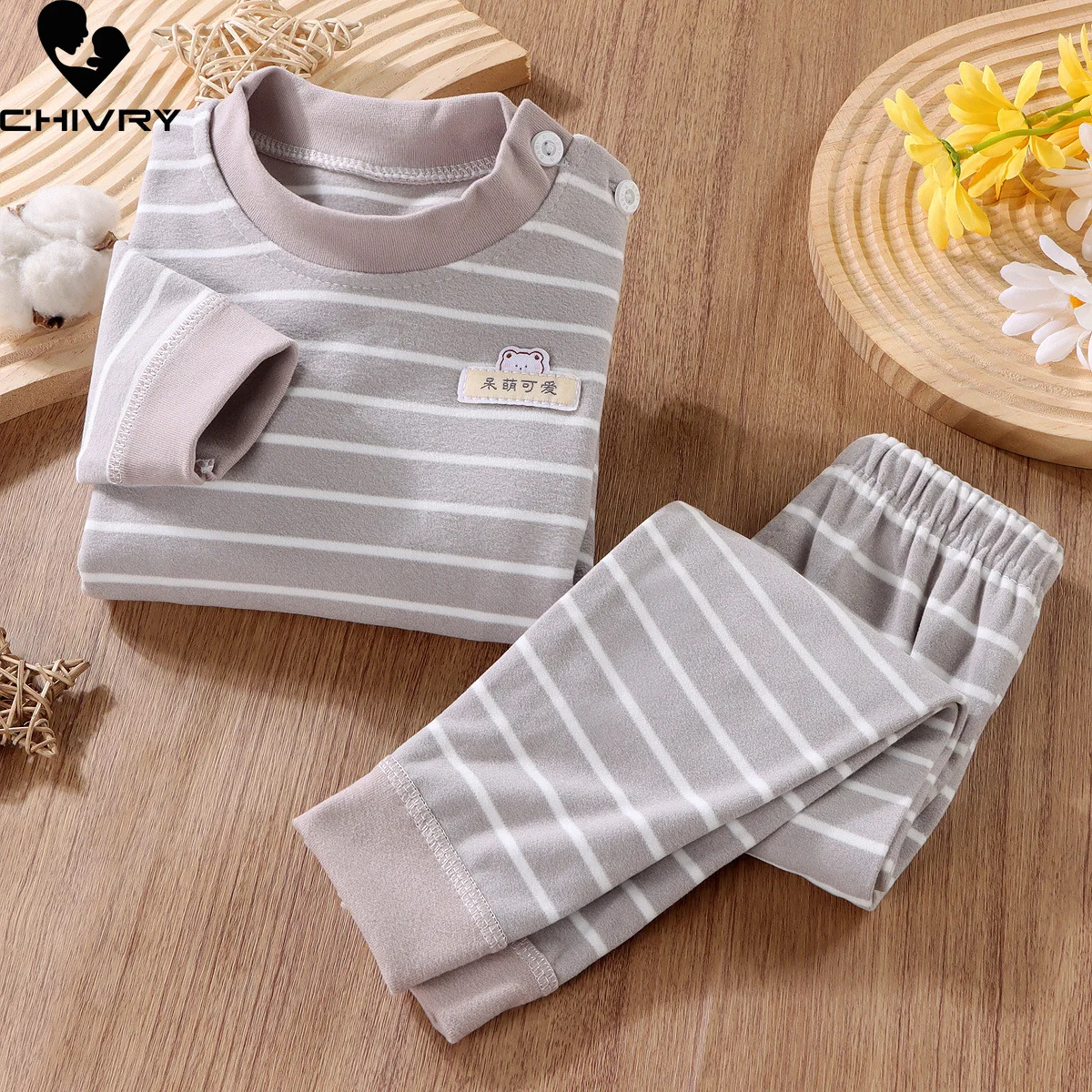 Conjunto de pijama a rayas para niños y niñas, camiseta de manga larga con cuello redondo y pantalones, ropa de dormir cálida para otoño, novedad de 2023