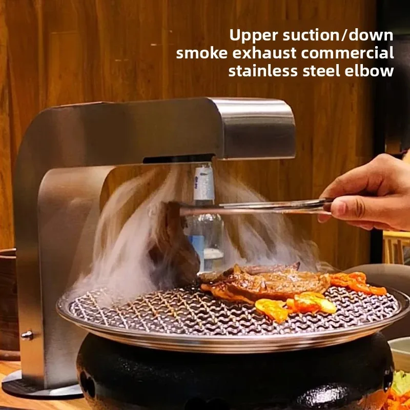 อุปกรณ์ดูดควันของร้านบาร์บีคิวพร้อมท่อดูดด้านบนและท่อไอเสียด้านล่างของคราบข้อศอกเชิงพาณิชย์หนาขึ้น