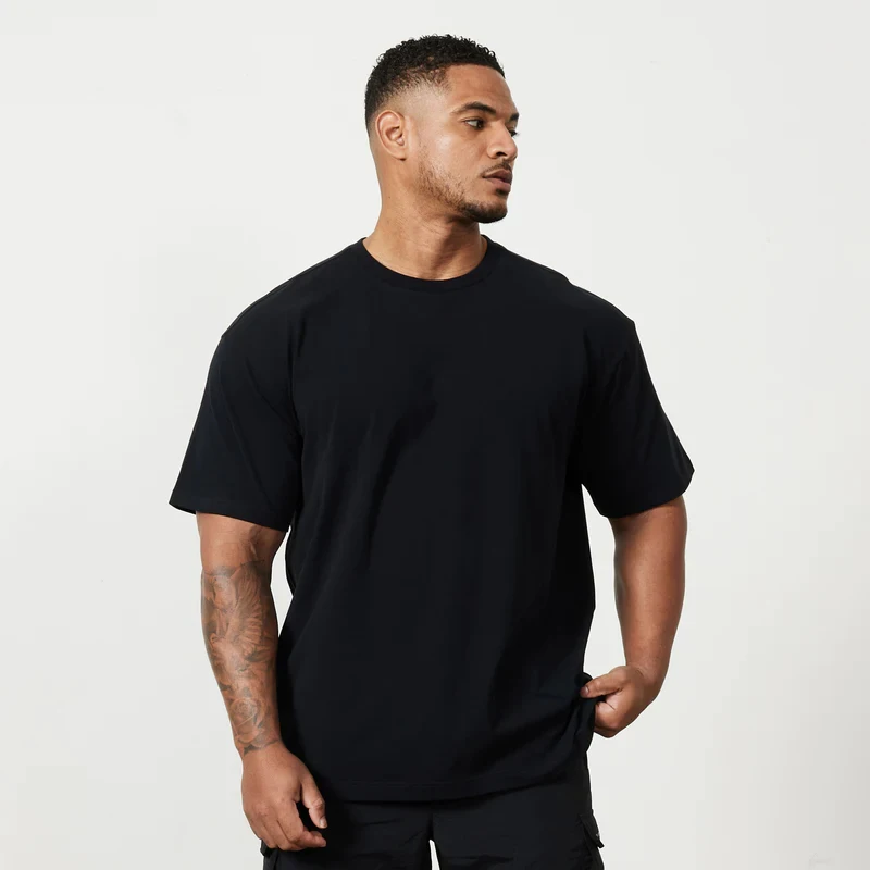 

Mens Casual Short Sleeve Summer T-Shirt Summer Plain Oversized Loose Gym Fitness Clothing Bodybuilding Muscle Cotton Breathable