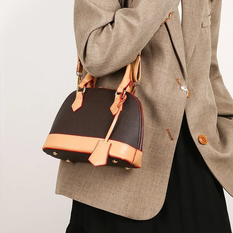 حقيبة أنيقة على شكل صدفة للنساء 2025 جديدة، محفظة كروس مونوغرام مع حزام قابل للتعديل، تصميم تشبه الجنية لجميع المناسبات