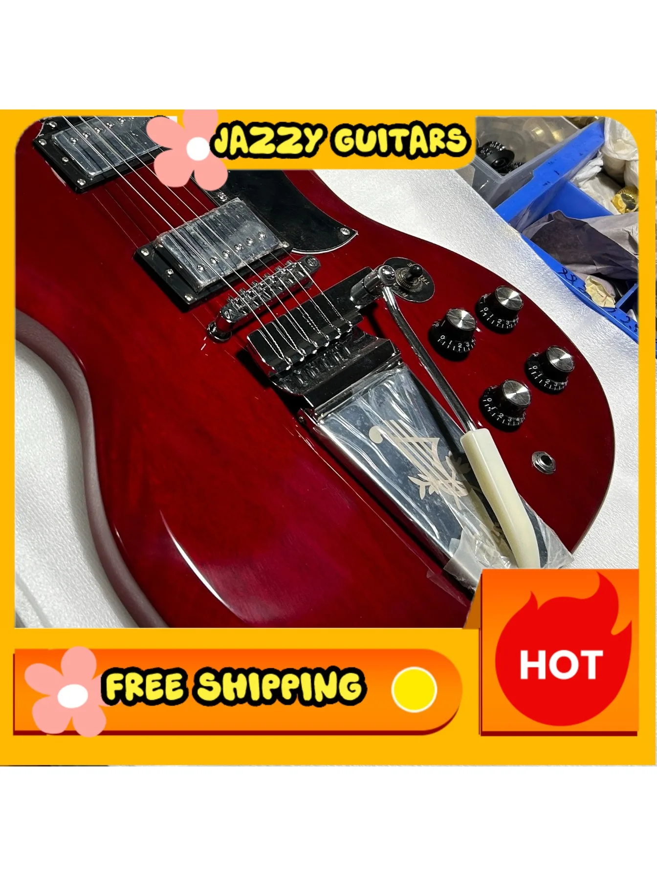 Transparente rote SG-Gitarre mit HH-Tonabnehmern und Maestro-Saitenhalter für dynamische Vintage-Rock- und Hard-Blues-Auftritte. Kostenloser Versand.