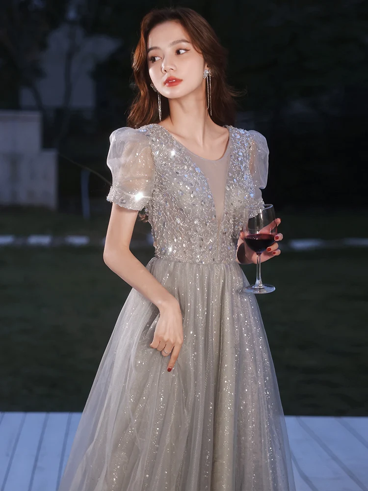 Robe de soirée longue grise à paillettes pour femmes, luxueuse tenue de soirée, col en v, à lacets, manches bouffantes, effet d'illusion