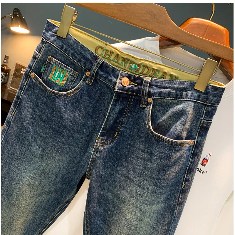 

High end light luxury men's jeans trend print new autumn men's clothing casual small feet retro blue pants