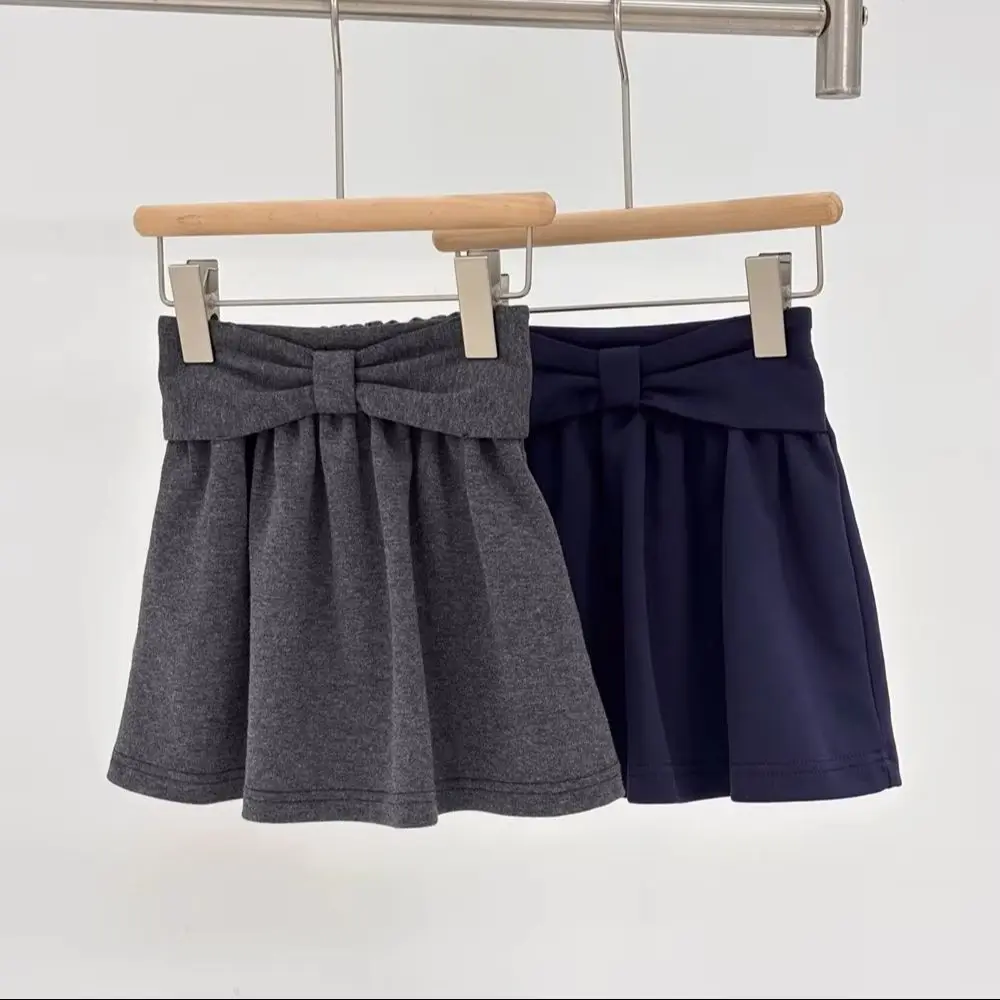 

Autumn baby girls clothes kids skirts Cotton bow shaped girls' skirt student style Sweet and lovely half skirt