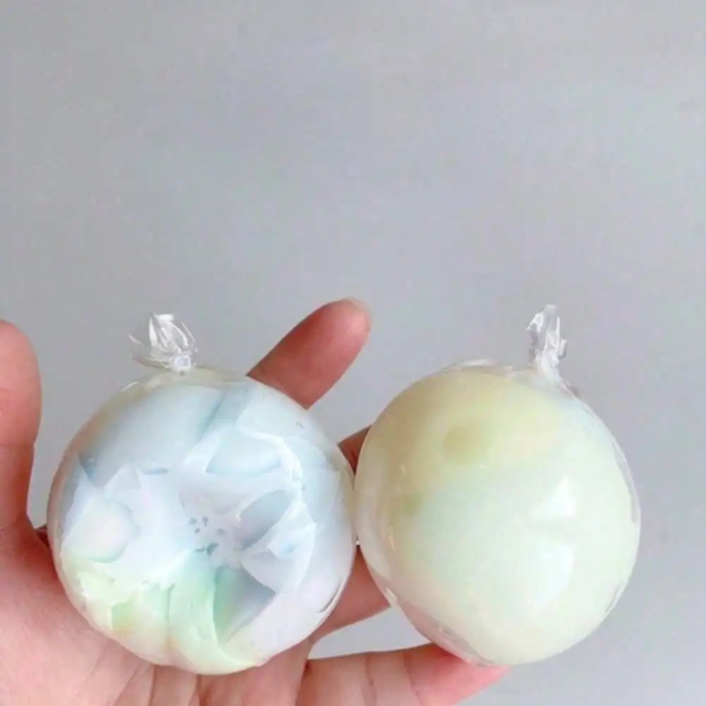 

Handmade Crispy, Slow-Rebound Sensory Squeeze Ball With A Waxy, Skin-Like Texture, Suitable For Adults And Children. Filled With Soft Clay, This Beautiful Desktop Relaxation Tool Makes A Pleasant Creaking Sound To Relieve Anxiety. A Must-Have Gift For The