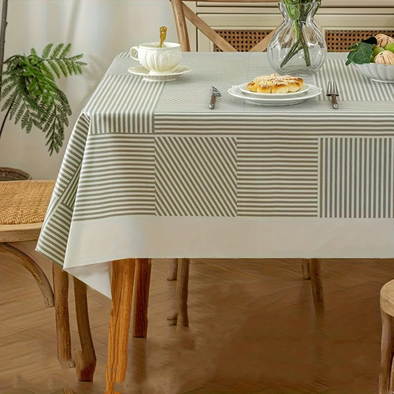Gray-toned striped tablecloth, featuring simple geometric elements. Elegant and practical. Easy to clean and maintain.