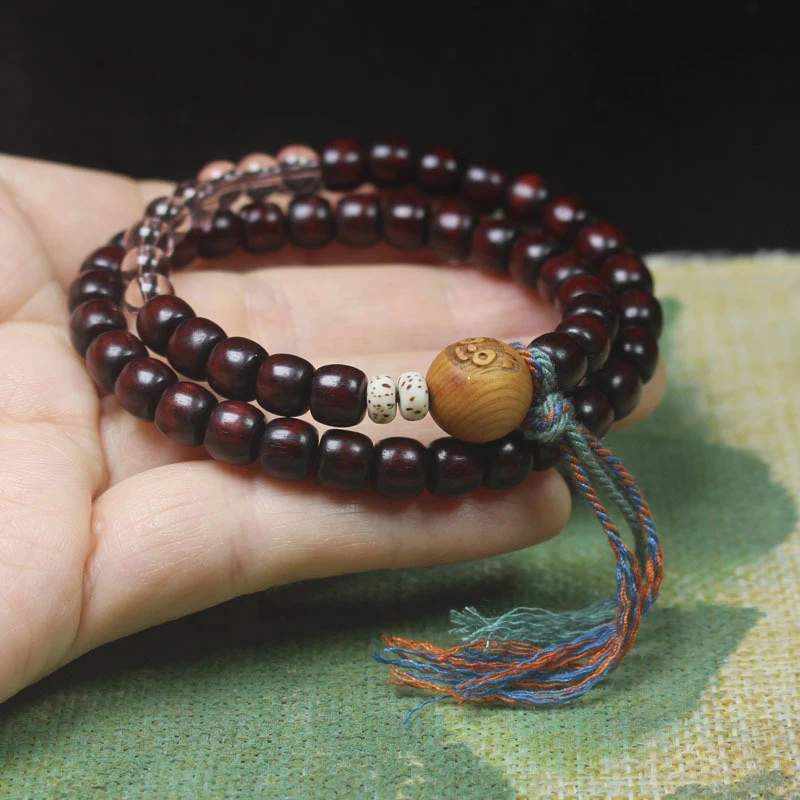 

Zambian rosewood blood sandalwood vintage-style beads double-loop bracelet with cat head design, simple cultural and artisti