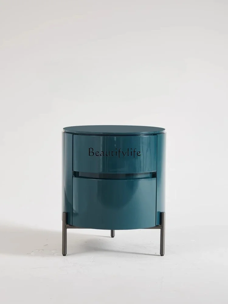 

Z.**Italian minimalist round paint bedside table solid wood designer bedside table high-end series