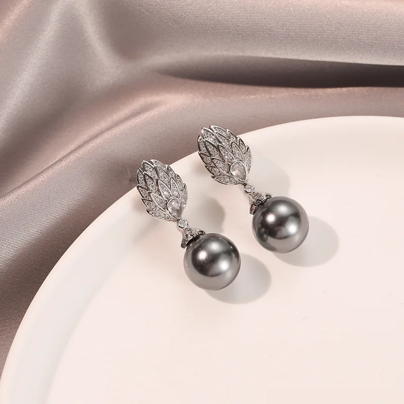 New silver-gray zirconia-studded earrings with an elegant design, exuding refined charm and being highly versatile.