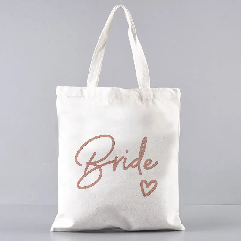 Team Bride-Bolso de mano grande e informal para mujer, bolsa de compras de lona con estampado de fuentes Rosas y blancas, de alta calidad, lavable