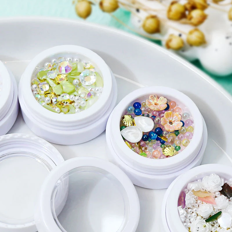 مکسڈ پرل روز فلاور رائنسٹون نیل آرٹ ڈیکوریشن فلاور جیم اسٹون نیل آرٹ چارمز لوازمات برائے یووی جیل نیل ٹپ ڈیزائن