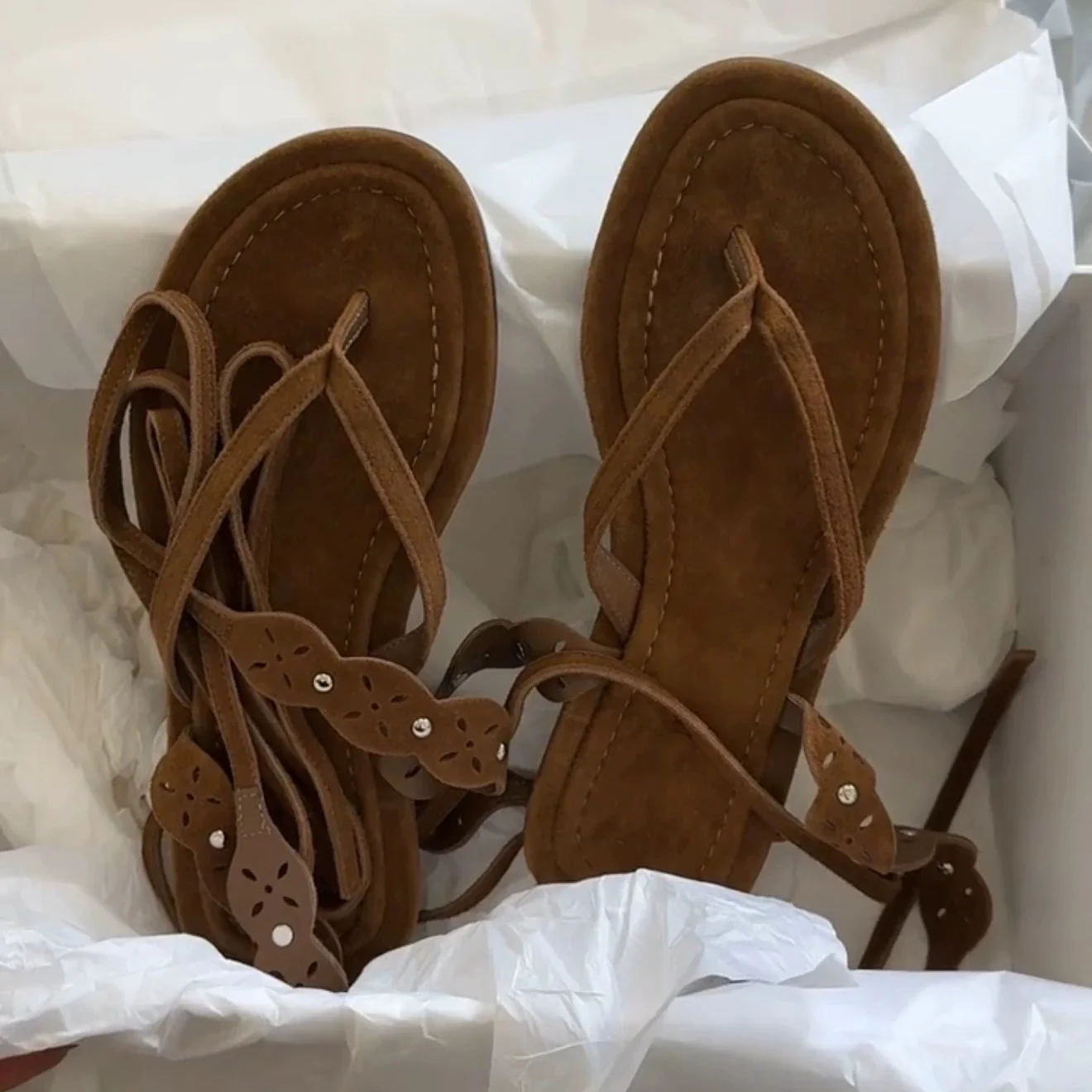 

Women's Brown Suede Thong Flat Sandals Hollow Cutout Adjustable Ankle Wrap Straps with Metal Rivets Bohemian Slip-On Footwear