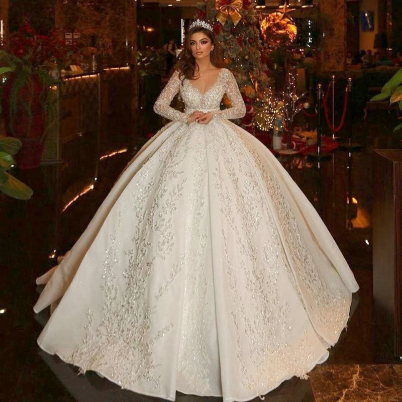 

Saudi Arabic Ball Gown Illusion Back Long Sleeve Wedding Dresses 2024 Princess Sweetheart Glitter Sequined Appliques Bride Gowns